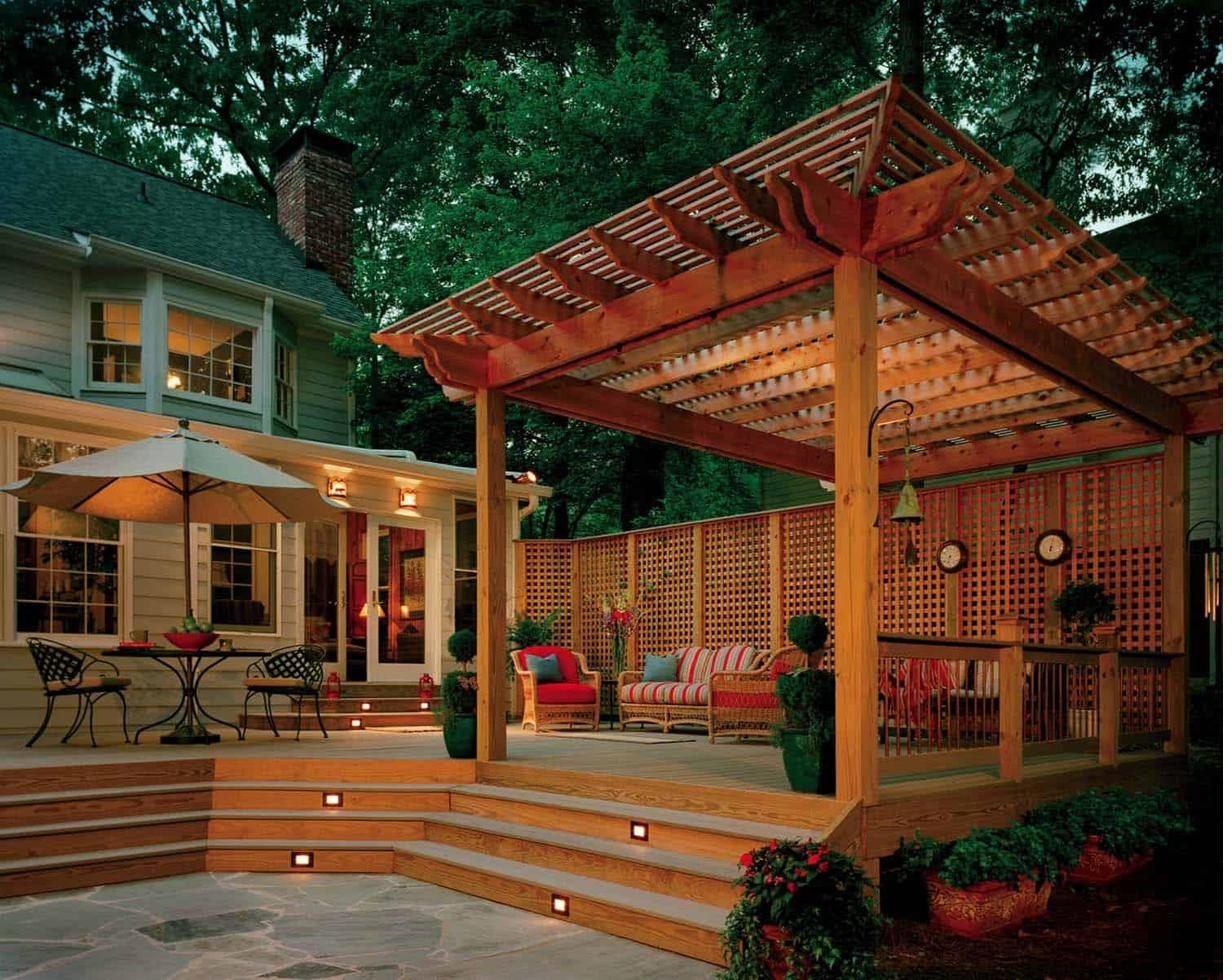Premium covered deck with pergola at dusk