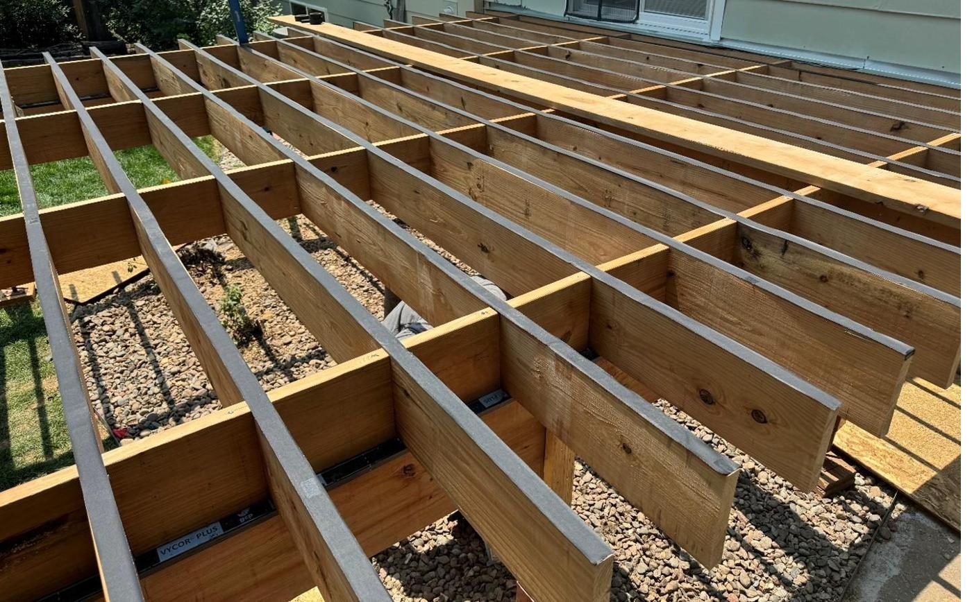 Engineered deck framing with load paths